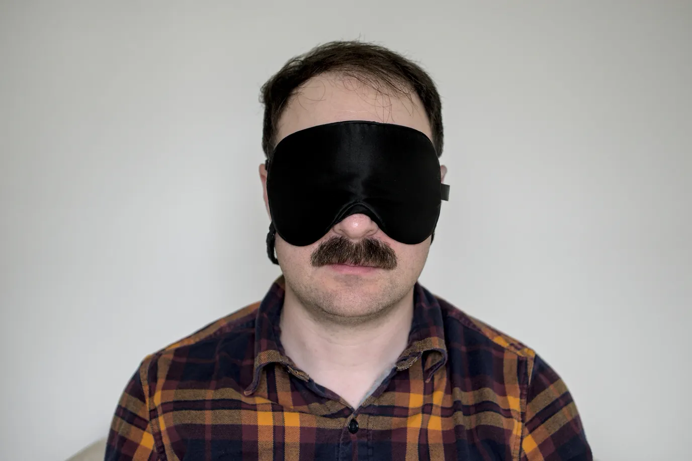 A photo of me wearing an Alaska Bear 2 Strap sleep mask