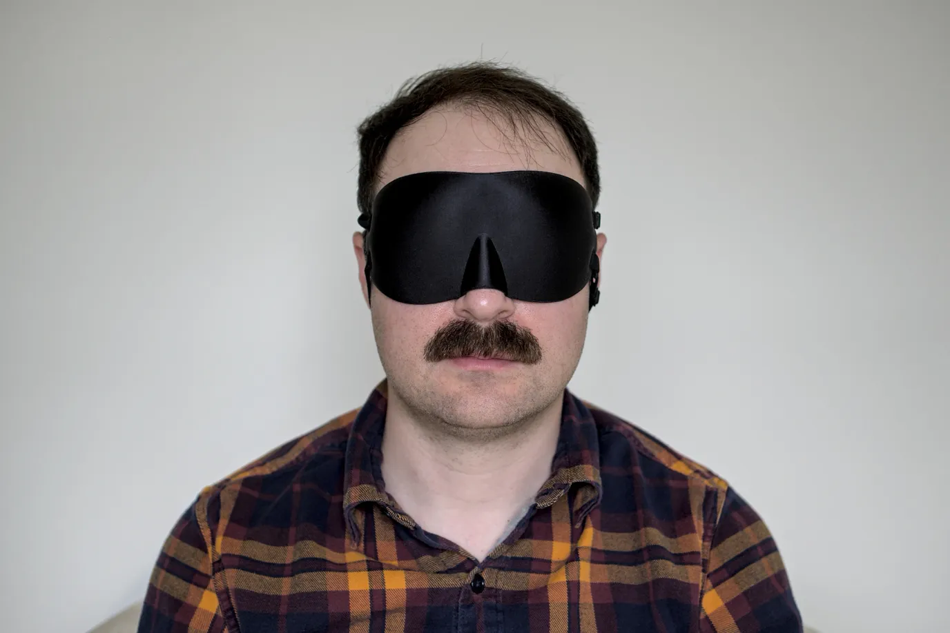 A photo of me wearing an Alaska Bear 2 Strap sleep mask