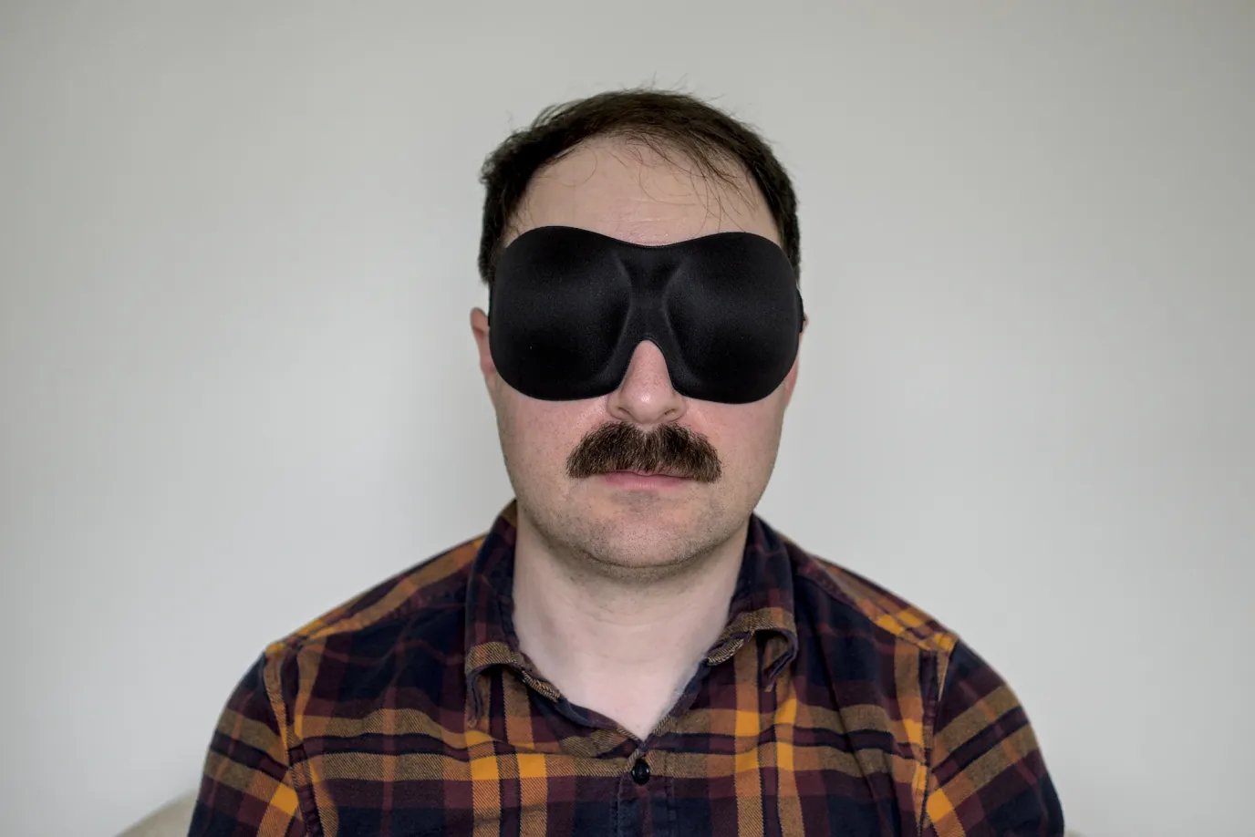 A photo of me wearing a Bucky 40 Blinks sleep mask