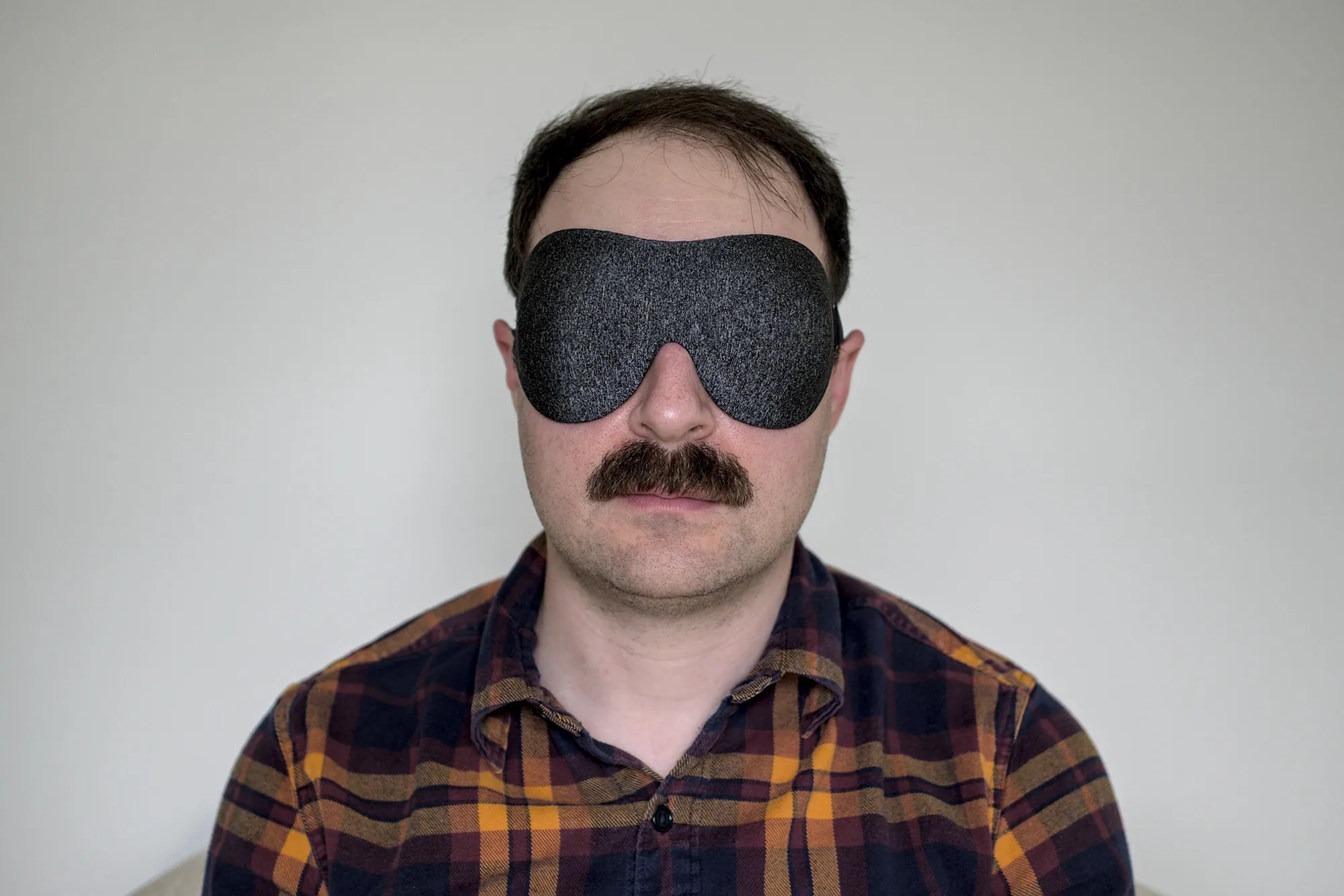 A slideshow of photos of me wearing sleep masks